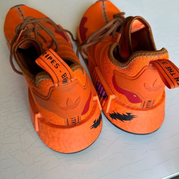 Adidas The South Park x  NMD_R1 \'Kenny\' sneakers feature a vibrant orange knit u main image 5